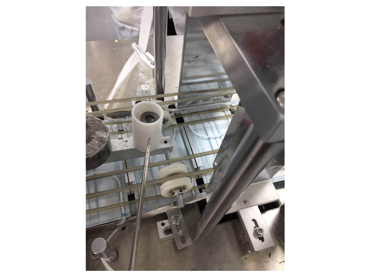 Mask machine feeding detail
